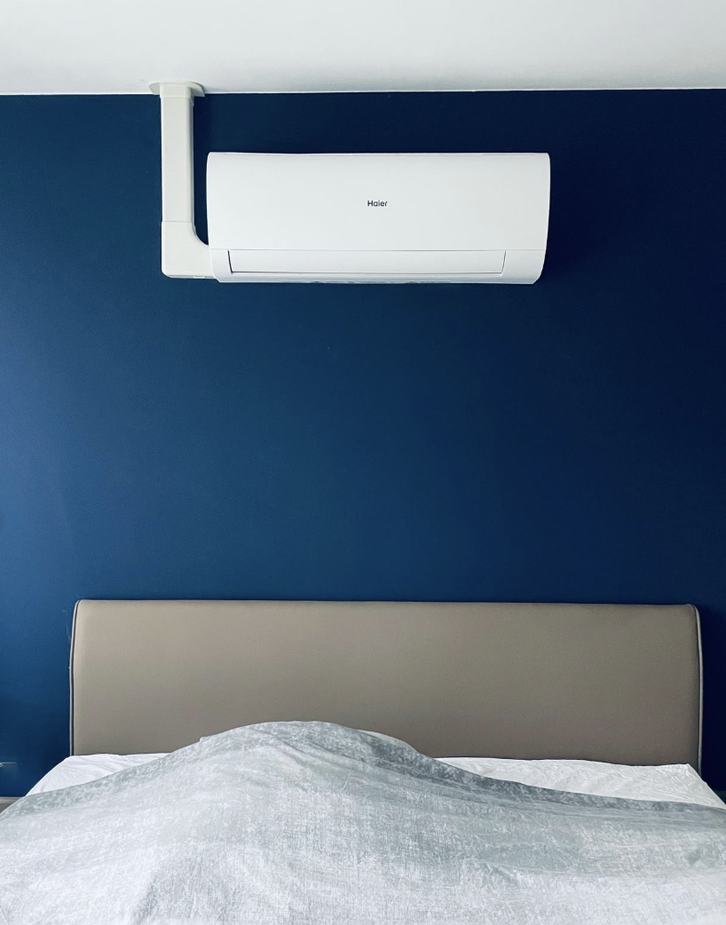 Haier airco slaapkamer blauwe wand